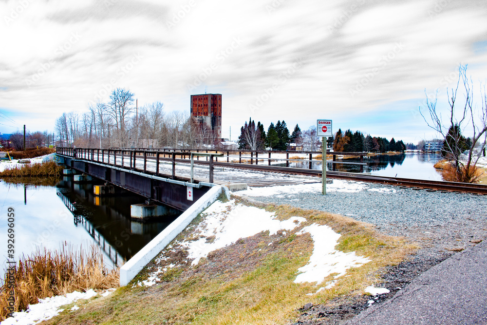 Fototapeta premium Railroad Crossing over a River