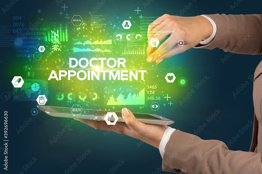 Close-up of a touchscreen with DOCTOR APPOINTMENT inscription, medical concept Close-up of a touchscreen with DOCTOR APPOINTMENT inscription, medical concept