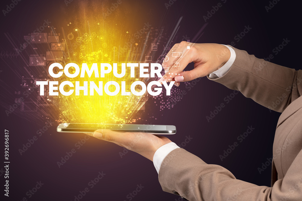 Close-up of a touchscreen with COMPUTER TECHNOLOGY inscription, innovative technology concept Close-up of a touchscreen with COMPUTER TECHNOLOGY inscription, innovative technology concept