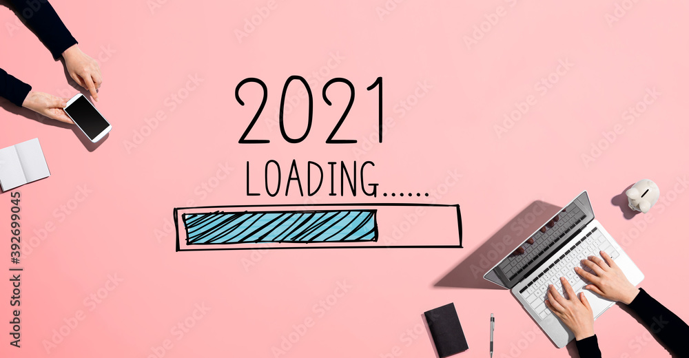 Loading new year 2021 with people working together with laptop and phone - obrazy, fototapety, plakaty 