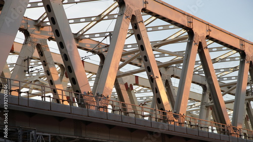 Railway metal bridge frame, Miscowindustrial architecture at summer day in sunshine rays
