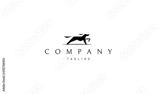 Vector logo on which an abstract image of a dog in training.