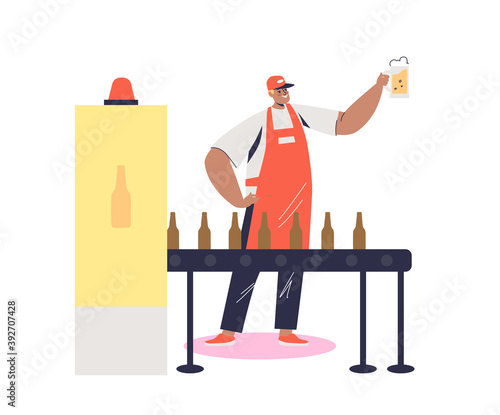 Beer bottling process at beer factory or brewery production. Brewer holding glass of fresh beer