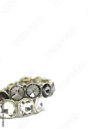 Two silver bracelet with diamonds isolated in white background with text space 