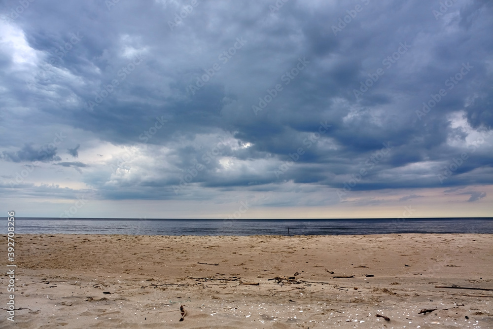 Baltic Sea beach during cloudy day.