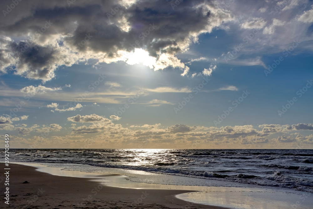 Sun is reflected in Baltic Sea during sunset.