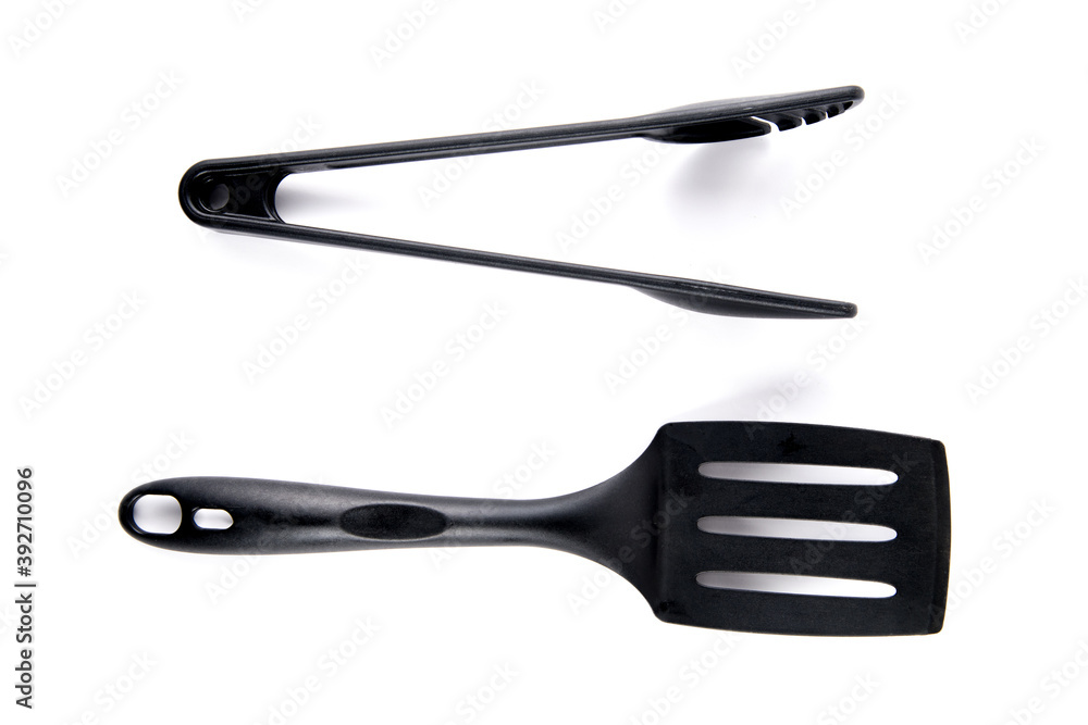 Kitchen utensils, spatula spoon and tongs Kitchen utensils, spatula spoon and tongs