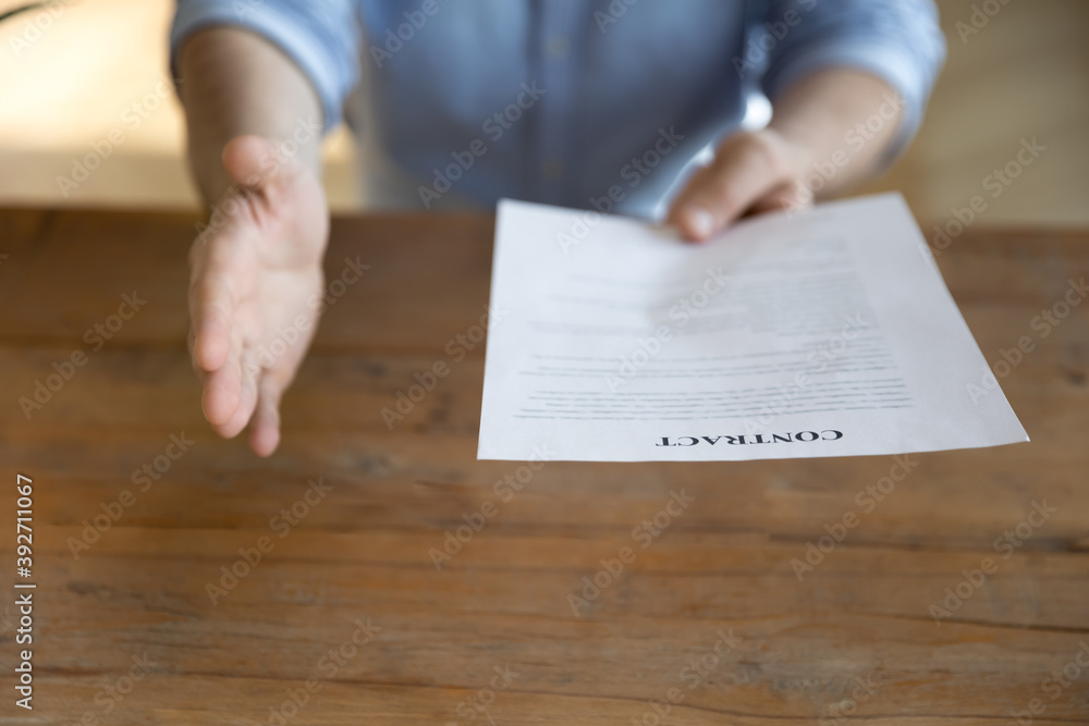 After contract signing business partner extend arm for handshake, congratulates with profitable deal making, close up. Good result, successful negotiations, partnership, future cooperation concept After contract signing business partner extend arm for handshake, congratulates with profitable deal making, close up. Good result, successful negotiations, partnership, future cooperation concept