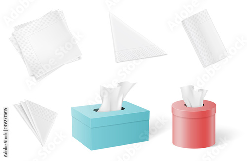 Set of paper napkins and tissues folded in different forms and inside of boxes
