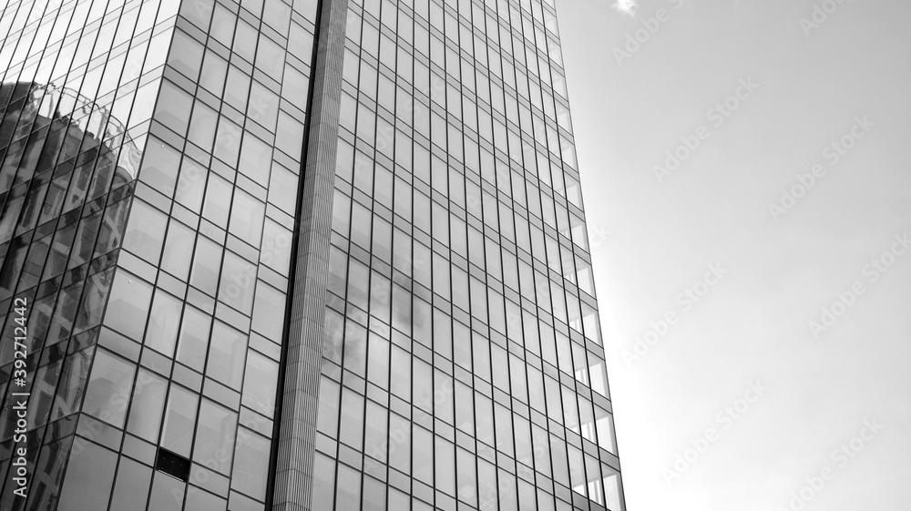 Abstract modern architecture with high contrast black and white tone. Architecture of geometry at glass window - monochrome. Black and white. Abstract modern architecture with high contrast black and white tone. Architecture of geometry at glass window - monochrome. Black and white.