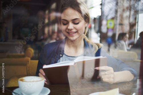 Woman reading book cafe vacation lifestyle Cup of coffee in the morning