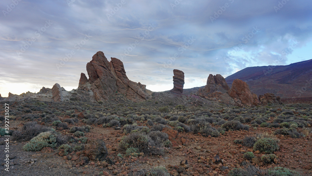 Teide National Park, Roques de Garcia, Tenerife, Canary Islands, Spain. Volcanic rocks and clouds after tropical storm Theta. Teide National Park, Roques de Garcia, Tenerife, Canary Islands, Spain. Volcanic rocks and clouds after tropical storm Theta.
