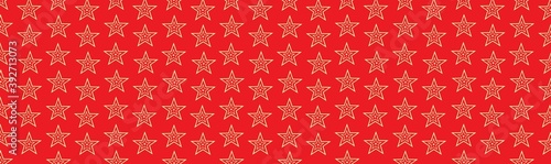 red background with gold stars. Christmas background, festive banner. Pattern for festive wrapping paper. 