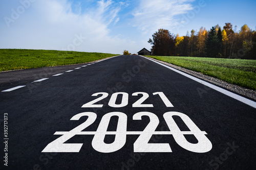 Wallpaper Mural a dark, new street with a white lettering "stop" on the ground Torontodigital.ca