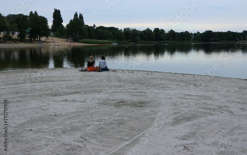 Two women on an empty beach