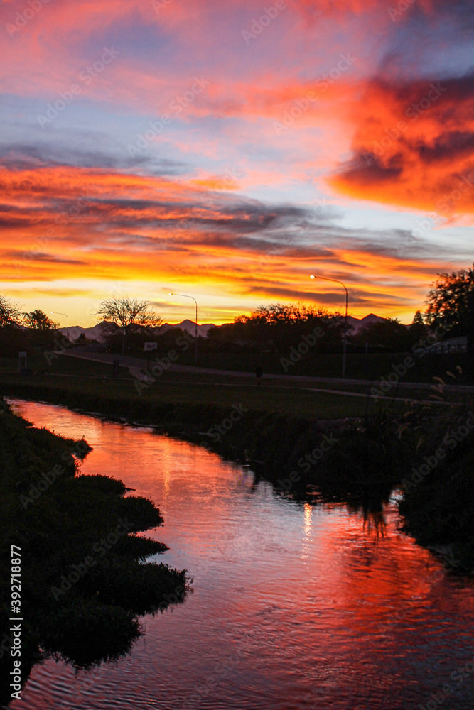 Obraz premium sunset over the river