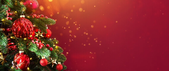 Decorated with ornaments and lights Christmas tree on red background. Merry Christmas and Happy Holidays greeting card, frame, banner. New Year. Noel	
