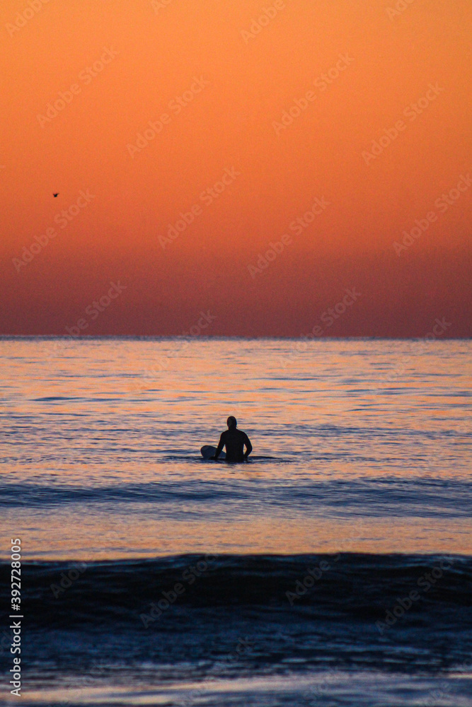surfer at dawn