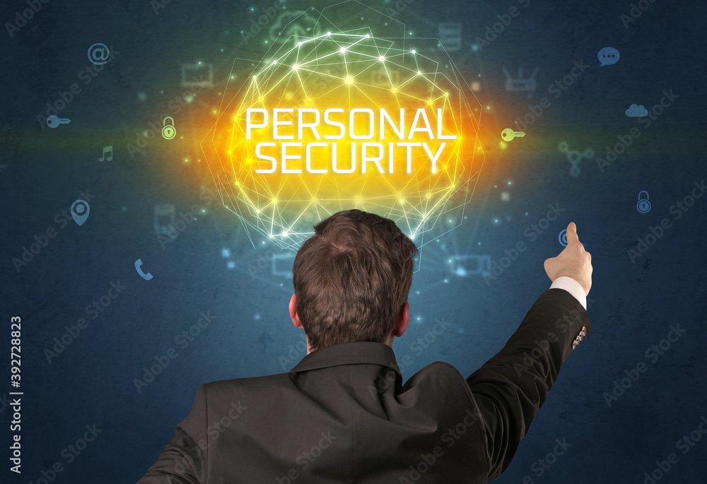 Rear view of a businessman with PERSONAL SECURITY inscription, online security concept Rear view of a businessman with PERSONAL SECURITY inscription, online security concept