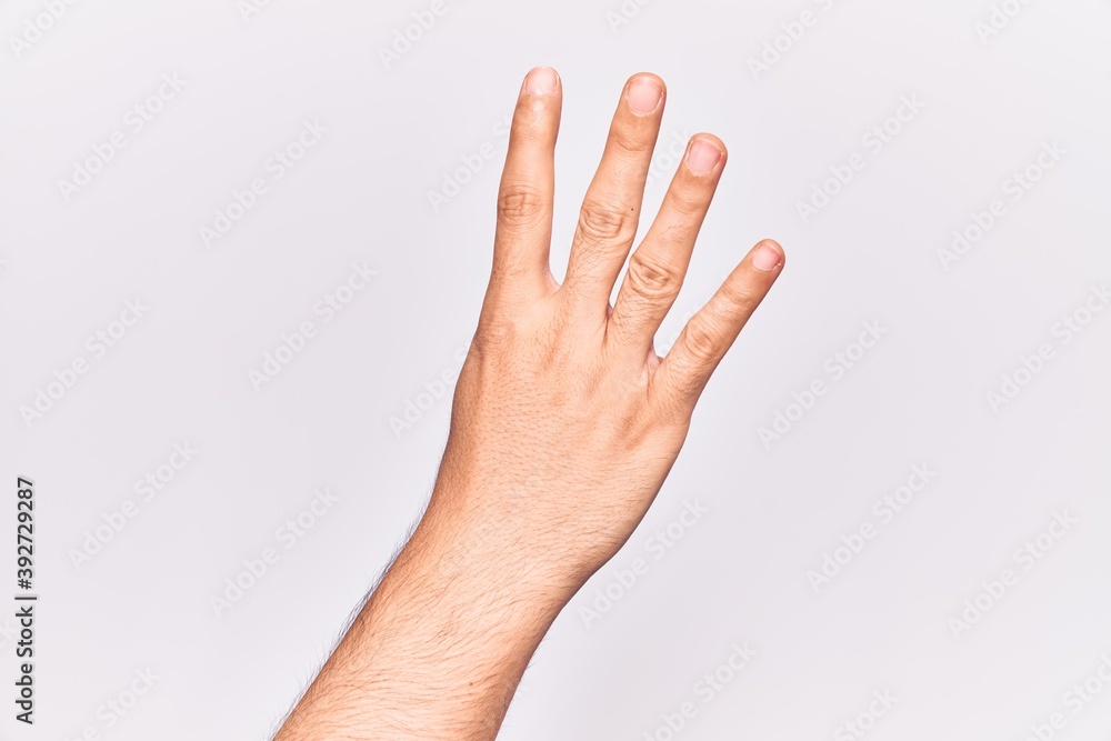Close up of hand of young caucasian man over isolated background counting number 4 showing four fingers Close up of hand of young caucasian man over isolated background counting number 4 showing four fingers