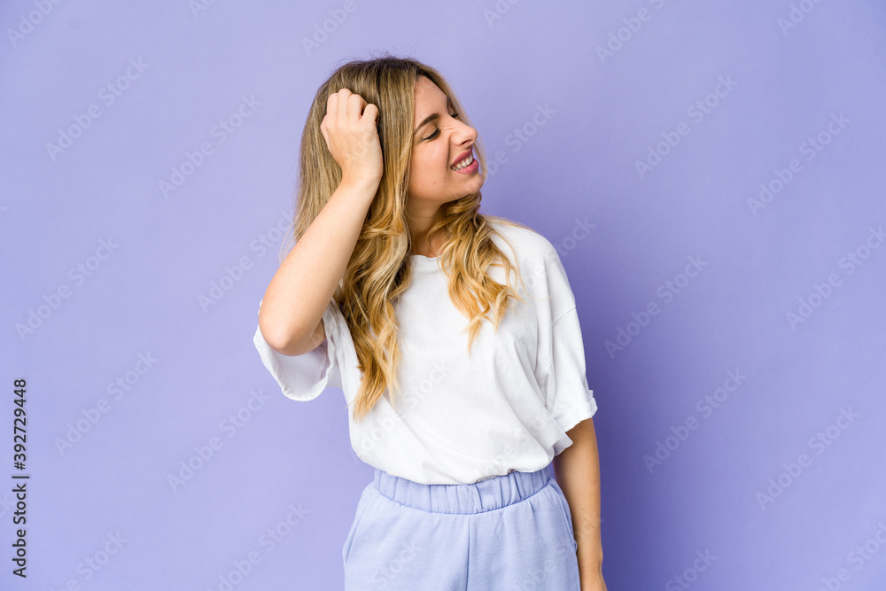 Young caucasian blonde woman celebrating a victory, passion and enthusiasm, happy expression. Young caucasian blonde woman celebrating a victory, passion and enthusiasm, happy expression.