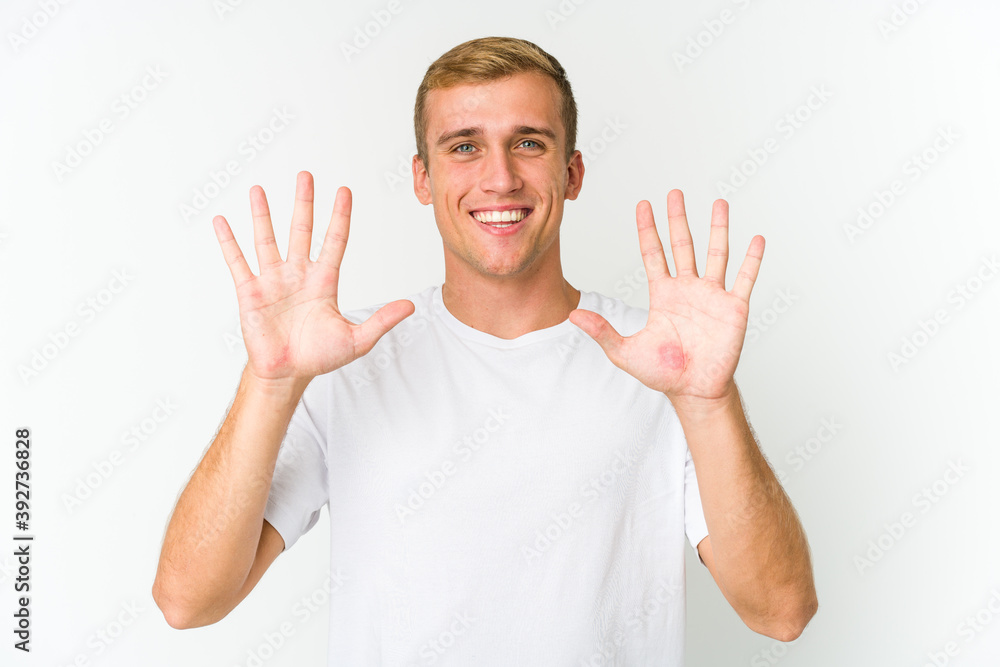Young caucasian handsome man showing number ten with hands. Young caucasian handsome man showing number ten with hands.