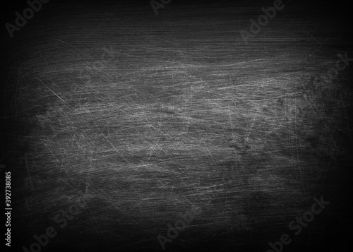 Dark  grunge and scratched black texture may used as background