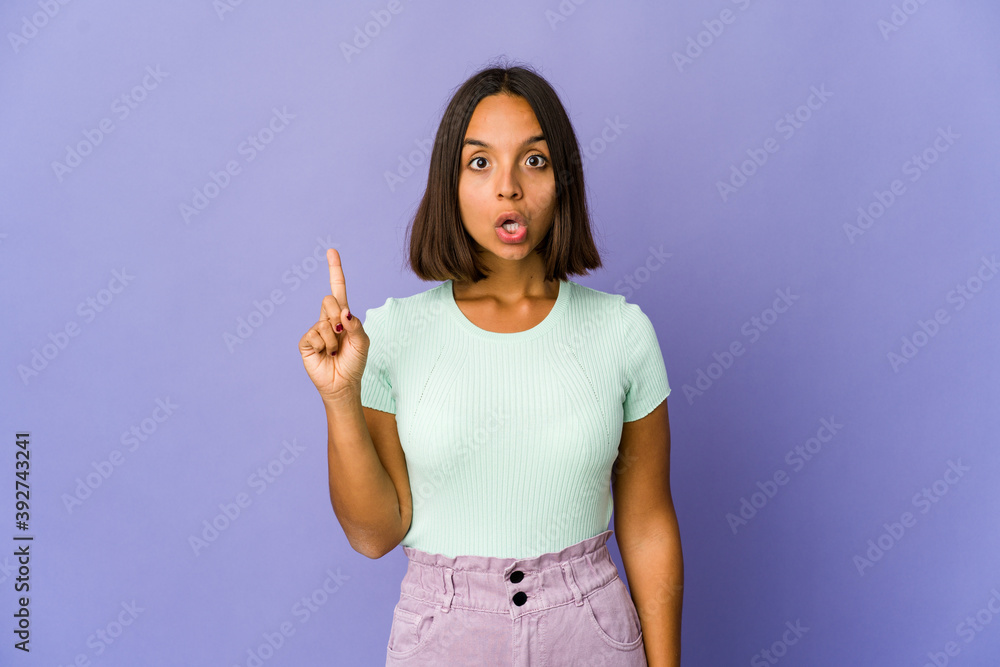 Young mixed race woman having some great idea, concept of creativity. Young mixed race woman having some great idea, concept of creativity.