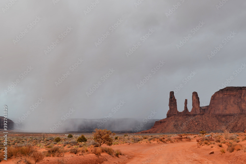Three Sisters rocks before the storm, Monument Valley, Utah