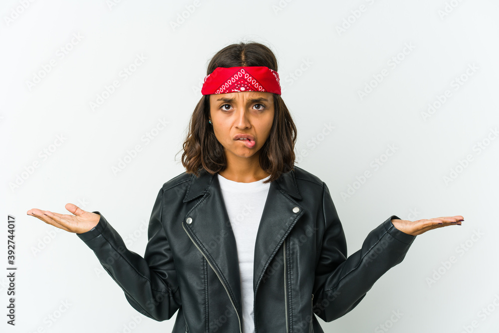 Young latin rocker woman isolated on white background Young latin rocker woman isolated on white background