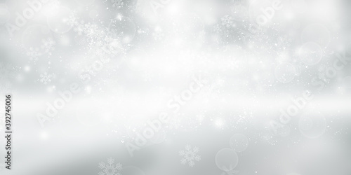 white snow blur abstract background. Bokeh Christmas blurred beautiful shiny Christmas lights © ooddysmile