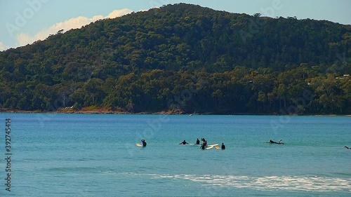 Surfers waiting for swell Noosa Main Beach