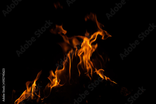 Fire flames on black background. fire burst texture for banner backdrop. © ooddysmile