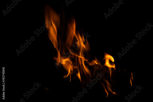 Fire flames on black background. fire burst texture for banner backdrop.