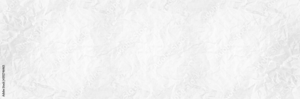 Fototapeta premium white and gray crumpled paper texture background. crush paper so that it becomes creased and wrinkled.