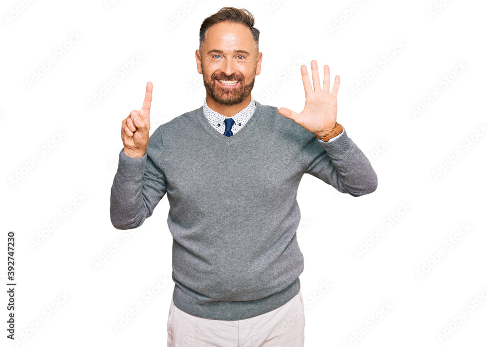 Handsome middle age man wearing business clothes showing and pointing up with fingers number six while smiling confident and happy. Handsome middle age man wearing business clothes showing and pointing up with fingers number six while smiling confident and happy.