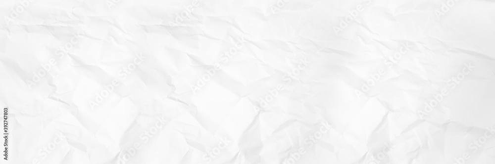 Long white and gray crumpled paper texture background. crush paper so that it becomes creased and wrinkled. Long white and gray crumpled paper texture background. crush paper so that it becomes creased and wrinkled.