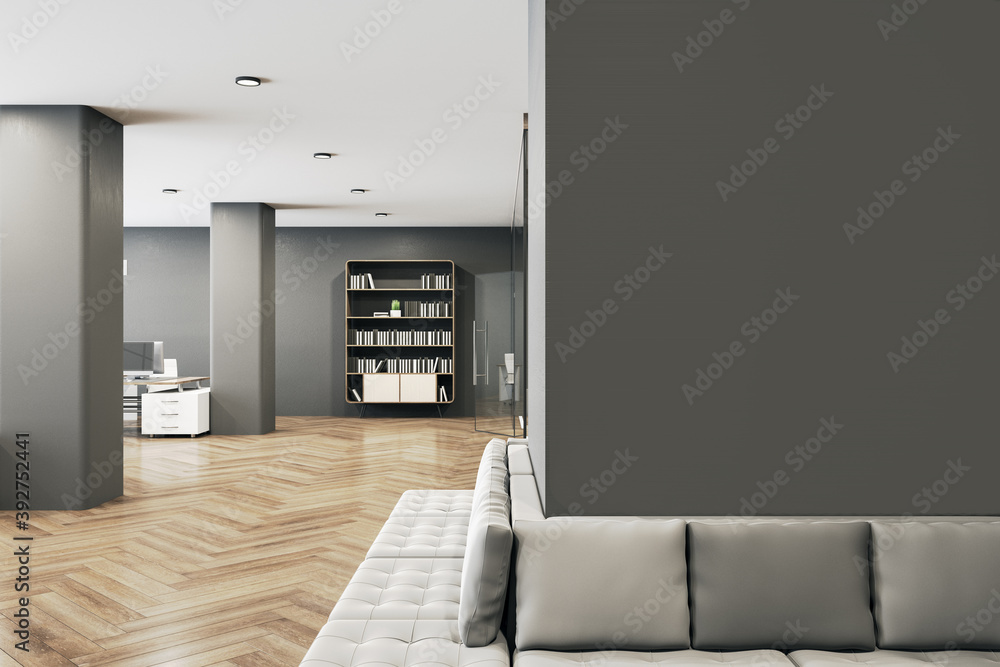 Fototapeta premium Hipster office in a loft style with blank wall.