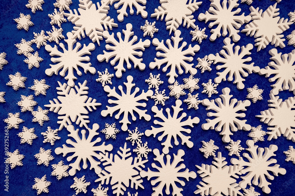 a lot of white foam snowflakes, New Year's decor for home, office, shop. a lot of white foam snowflakes, New Year's decor for home, office, shop.