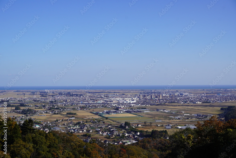 Fototapeta premium 高台からみた地方の町の風景（宮城県仙台市、名取市、岩沼市）/The view of around Sendai, Natori and Iwanuma city in Japan