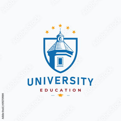 School tower building with shield and stars
