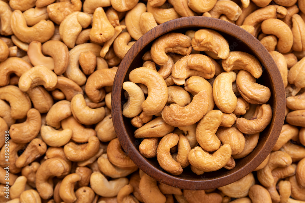 Top view of roasted cashew nuts in the bowl Top view of roasted cashew nuts in the bowl