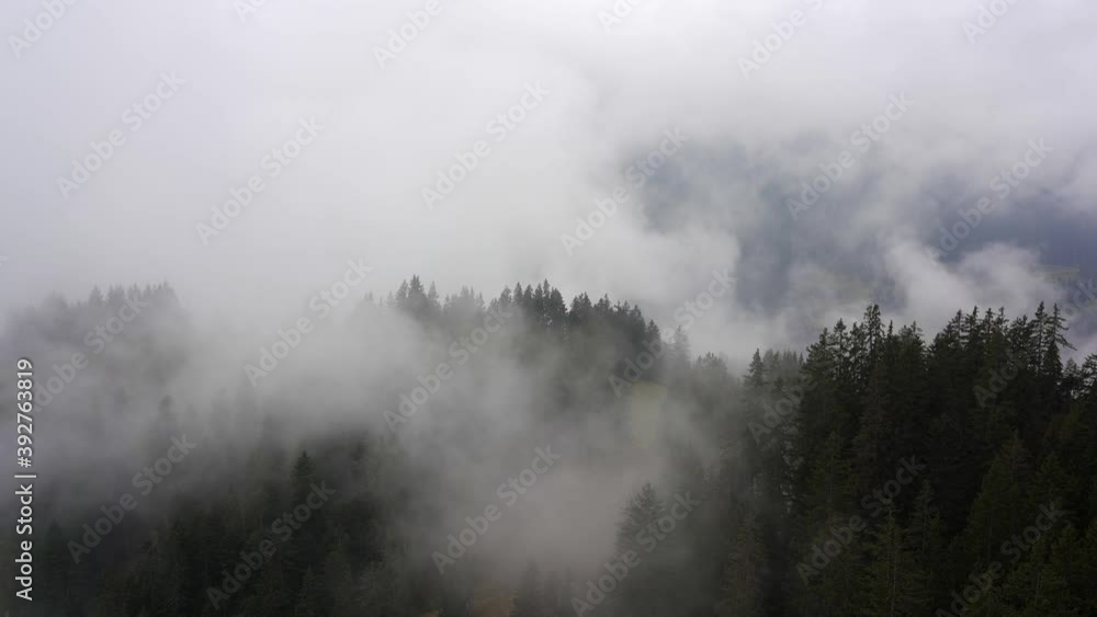 Dramatic low clouds obscure the valley floor in the mountains of the alps. Lermoos, Ehrwald, Tyrol, Austria Dramatic low clouds obscure the valley floor in the mountains of the alps. Lermoos, Ehrwald, Tyrol, Austria