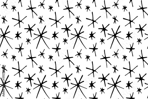 Vector seamless pattern from hand drawn snowflakes in doodle style. Winter, christmas, new year background and texture. Snowfall and night sky