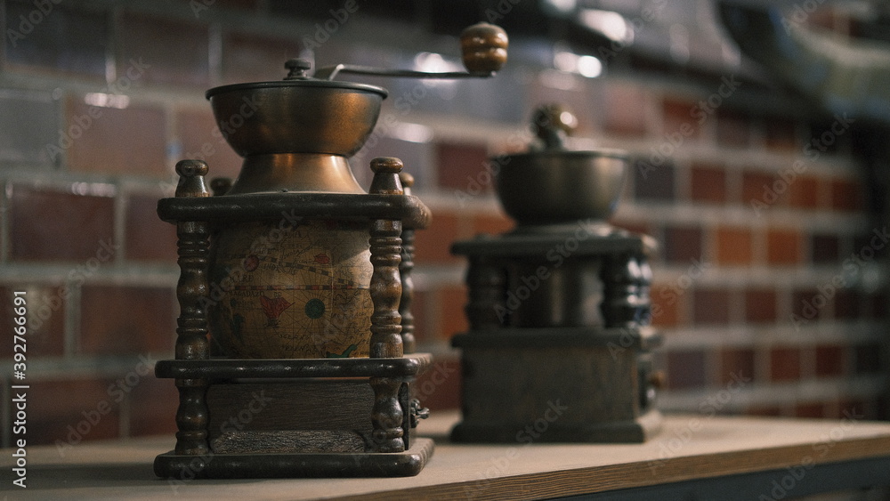 antique coffee grinders with beautiful globe design