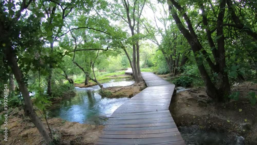 Walking on a footbridge at Krka National Park, Croatia Walking on a footbridge at Krka National Park, Croatia