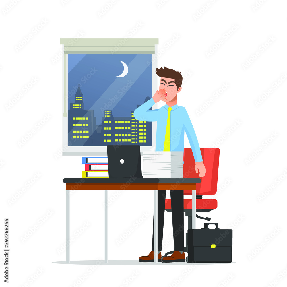 An employee working overtime at the office An employee working overtime at the office