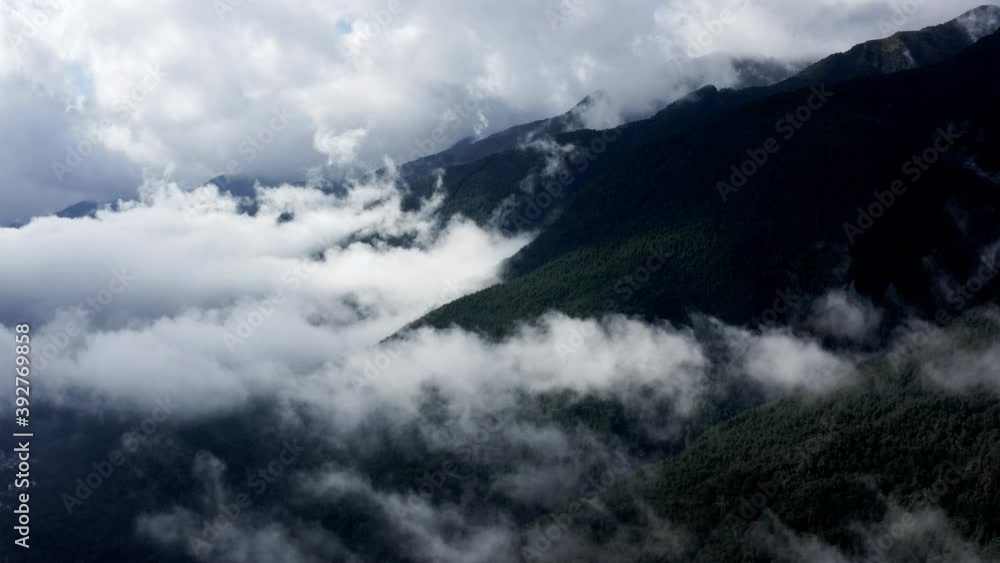 Dramatic cloudy Cangshan Mountains in Yunnan, China, aerial view Dramatic cloudy Cangshan Mountains in Yunnan, China, aerial view