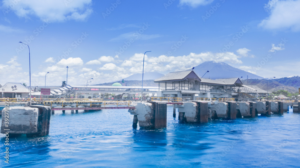 Beautiful Ketapang harbor with misty mountain Beautiful Ketapang harbor with misty mountain
