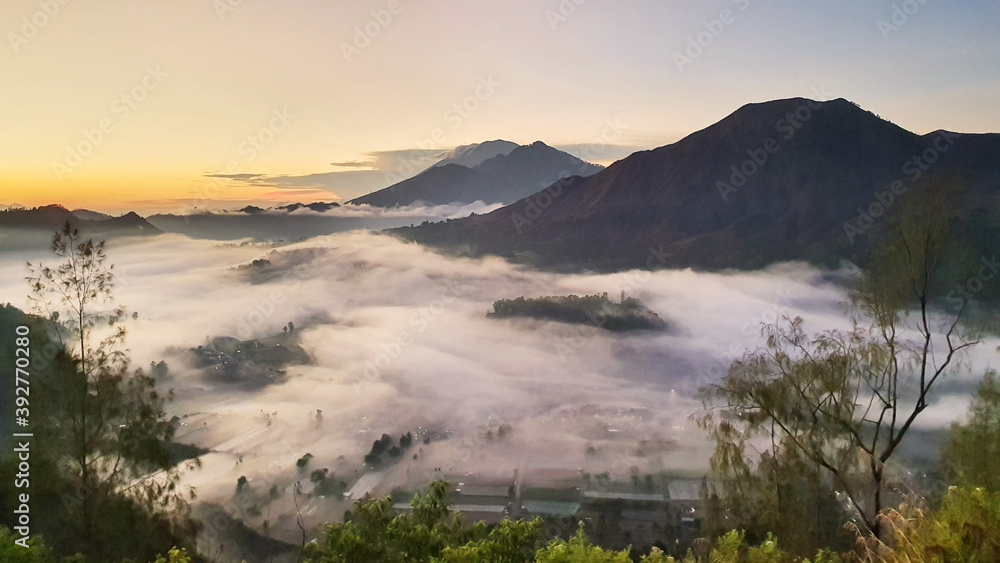 Beautiful misty Pinggan village at sunrise time
